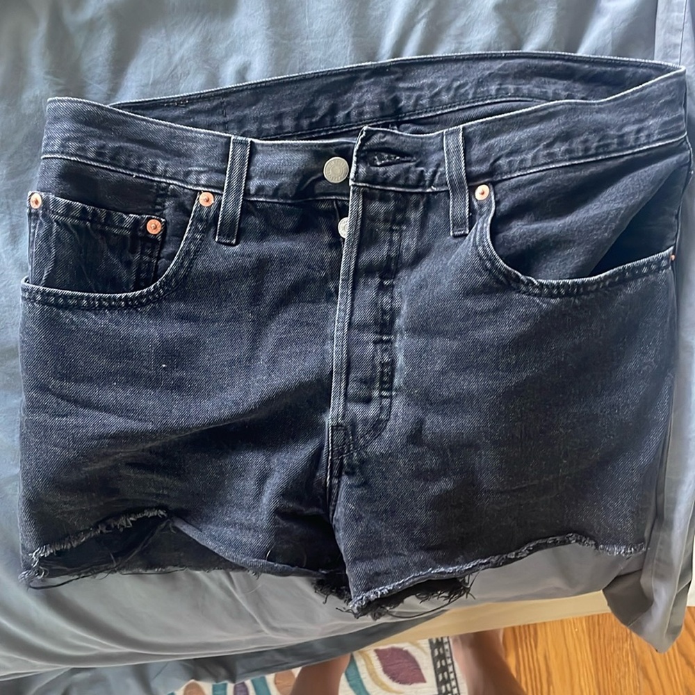 Distressed black Levi shorts